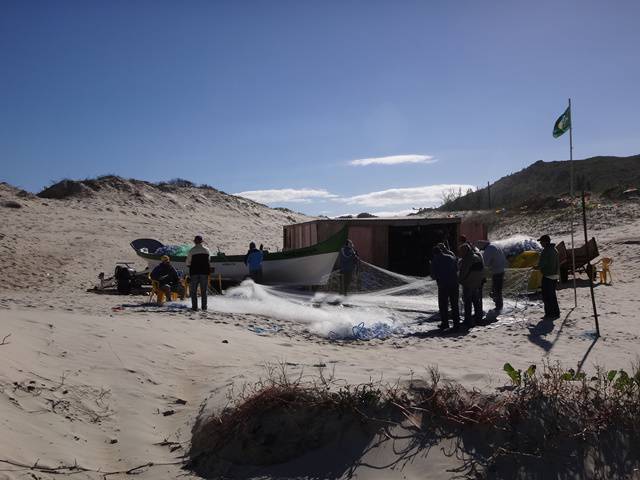 Pescadores na Praia da Joaquina.