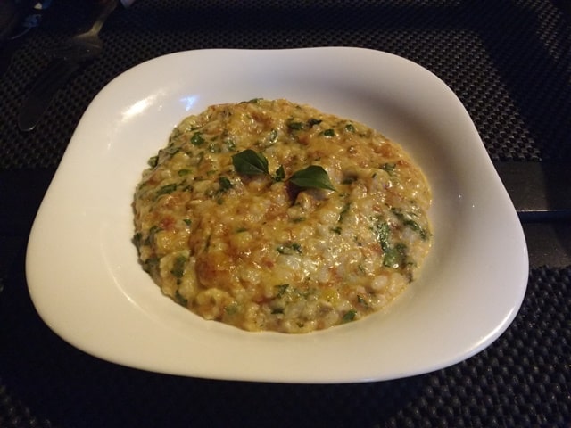 Risoto com tomate seco, rúcula e parmesão - restaurante Fatto di Bufala, em Brotas.