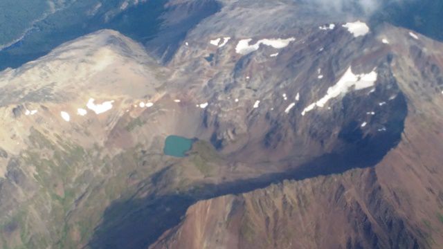 Pode ser a Laguna Esmeralda, ou outro lago qualquer na Cordilheira